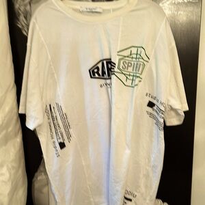 Four Givenchy logos  on front… red GG on back